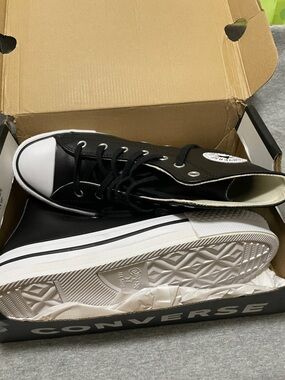 Converse Black and White High Top Athletic Shoes